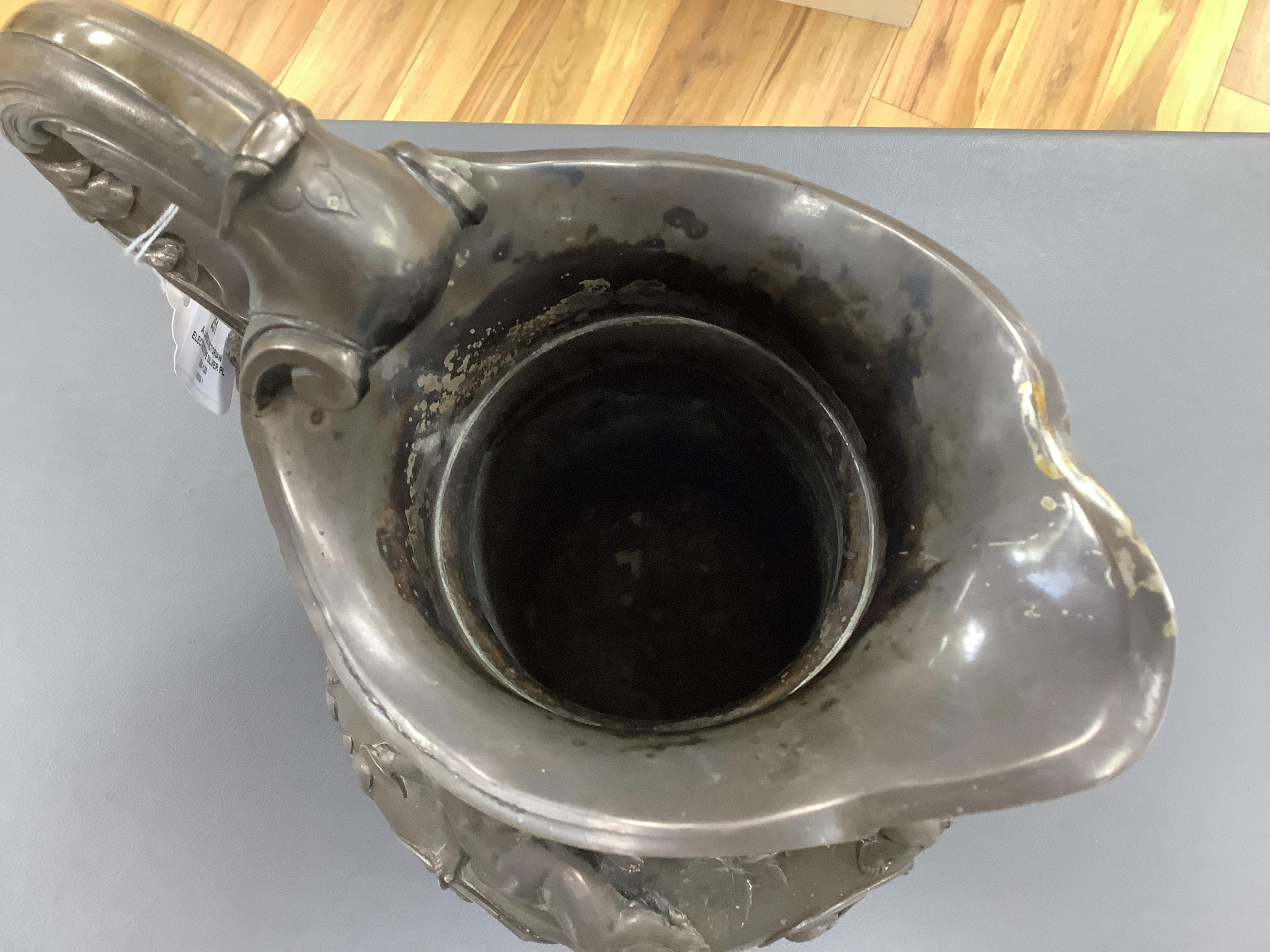 A large Victorian electrotype silver plated jug, in the manner of Elkington & Co., 28cm